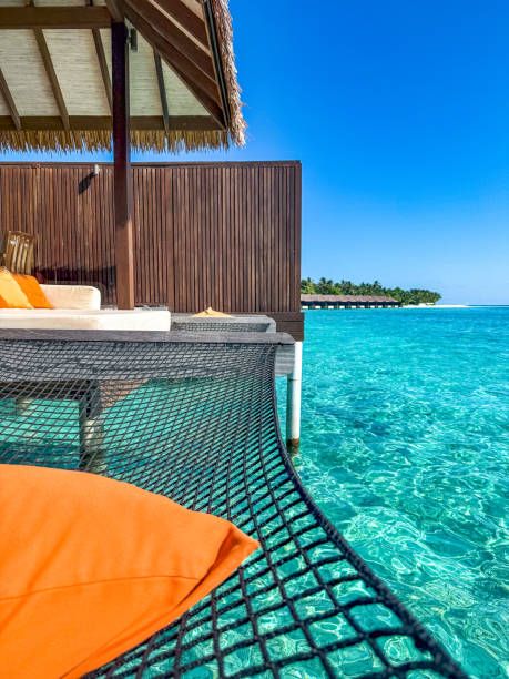 istock Sunset views from overwater pool villa in Maldives 2184097862