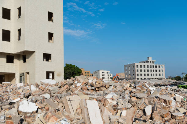 istock Construction machinery is demolishing the house 2184098331