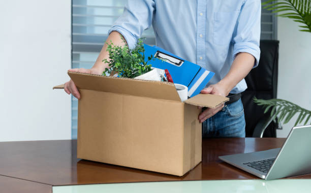 istock Unemployed man packing his belongings 2184098485