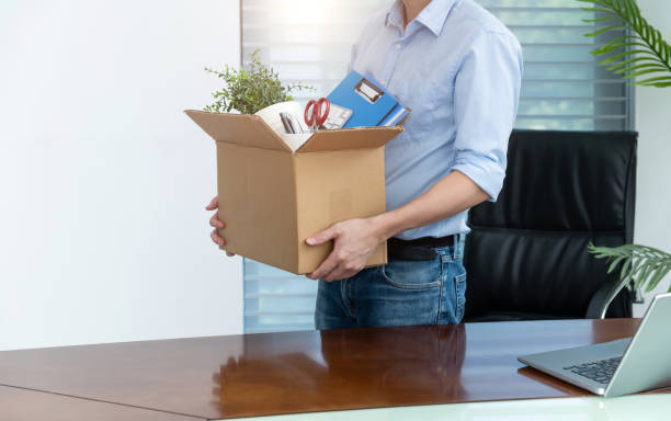 istock Unemployed man packing his belongings 2184098492