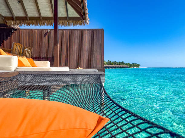 istock Sunset views from overwater pool villa in Maldives 2184099800