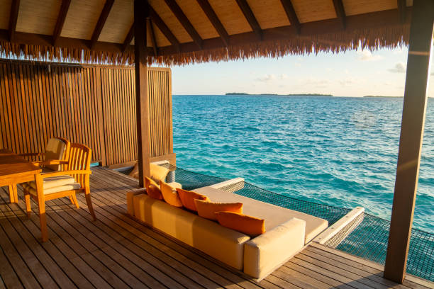istock Sunset views from overwater pool villa in Maldives 2184099921