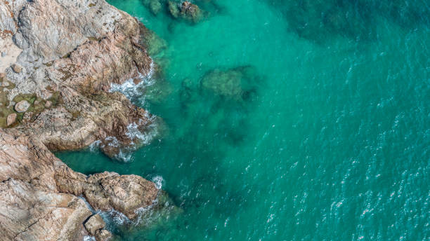 istock Rocky coastline cliffs, sea water surface aerial view with copy space. 2184099965