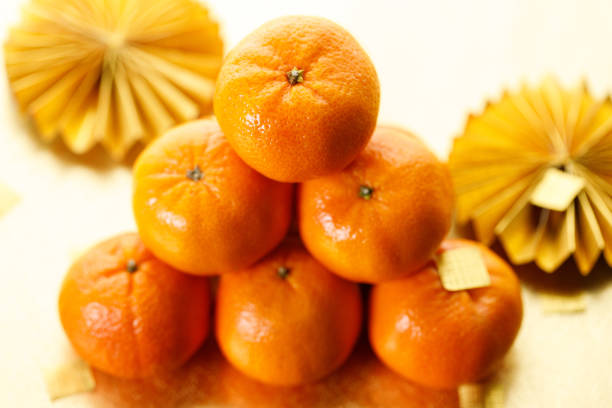 Tangerine oranges on golden background for celebration Lunar New Year or Chinese New Year