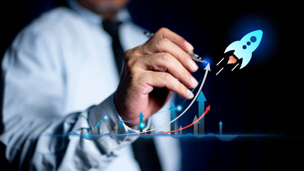istock Businessman touch visual screen rising arrow, representing business growth. Financial growth chart Investment concept. 2184104428