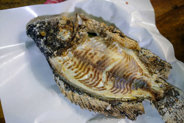 istock Selective focus on grilled Tilapia fish that covered with salt grill. 2184106206