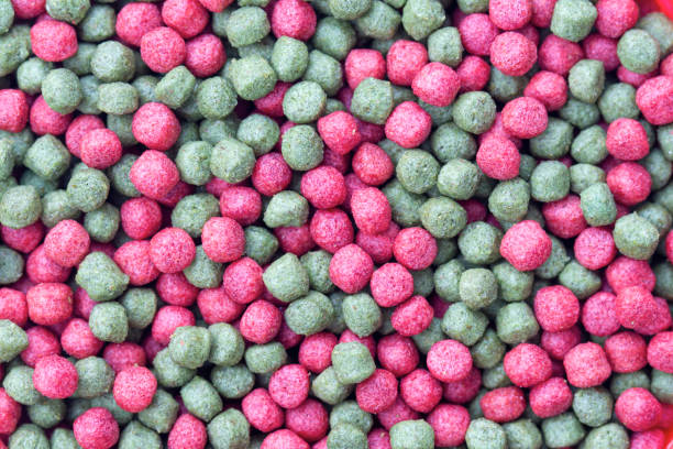 istock pellets staple food for commercial fish pets 2184108067