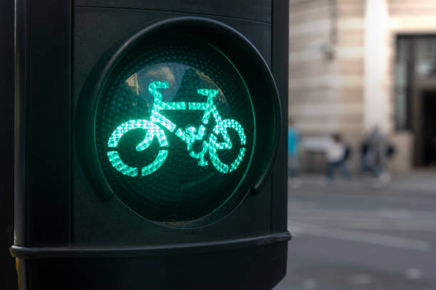 Green traffic light for cyclists, sustainable transport concept
