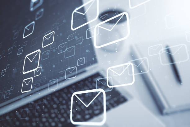 istock Creative concept of postal envelopes illustration on modern laptop background. Email and communications concept. Multiexposure 2184114584