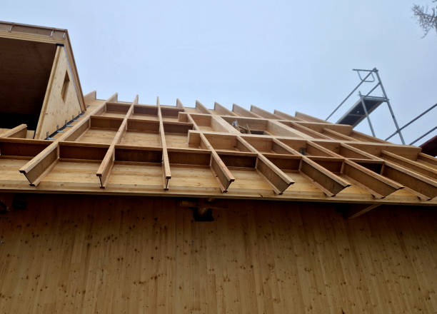 istock Sandwich wood construction, perimeter walls composed of several layers of different materials. column structure, panel wood construction, double-walled timber with inserted insulation 2184115409