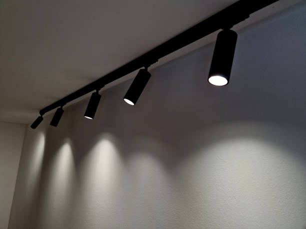 istock the ceiling of the corridor in the plasterboard soffit is equipped with light halogens illuminating the ramp on the stage or in the shop. the goods look better if there are strong lamps in the ceiling 2184115554