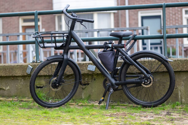 istock Modern Urban Bicycle Parked by the Canal 2184115915