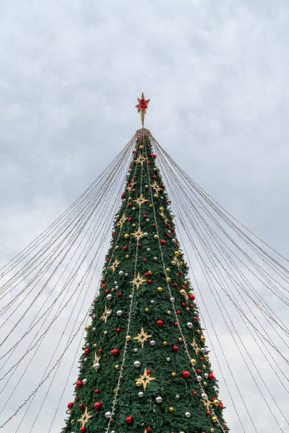 istock Decorative Christmas tree adorned with ornaments at festive location 2184116904