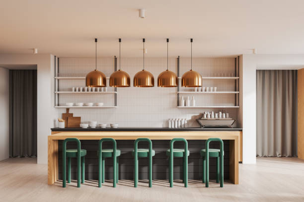 istock Modern kitchen featuring green bar stools, copper pendant lights, and minimalist shelving on a neutral background. Concept of contemporary interior. 3D Rendering 2184117497