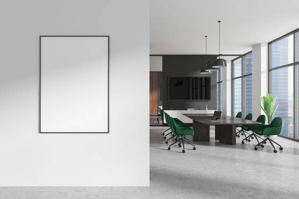 istock Blank poster mockup on a wall in a modern conference room. 3D Rendering 2184117585