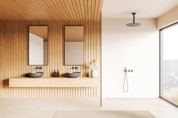 istock Modern bathroom with wooden accents and mirrors. 3D Rendering 2184118068
