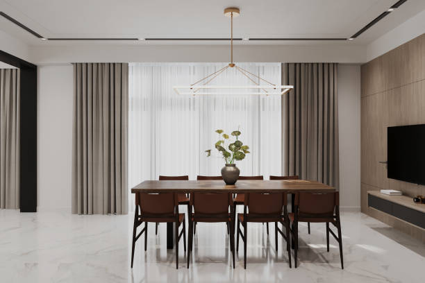 istock Modern Minimalist Dining Room with Elegant Lighting and Wooden Table 2184119322