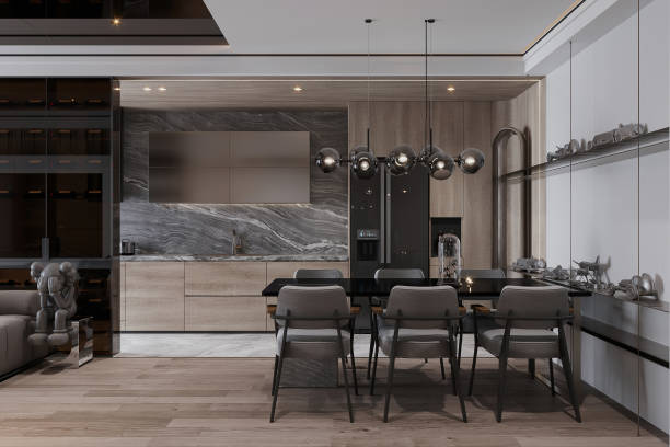 istock Modern Open-Concept Kitchen and Dining Area with Sleek Gray Cabinets and Designer Lighting 2184120236