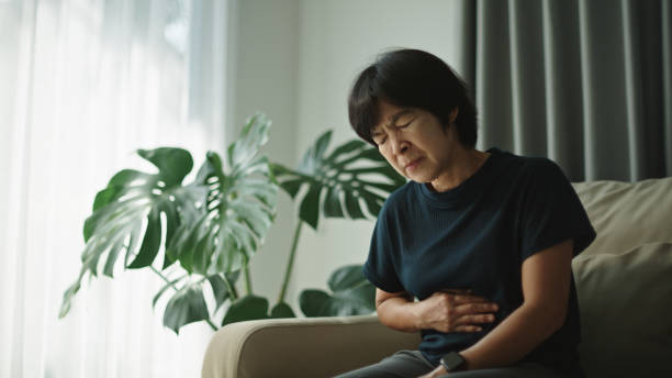 istock Mature woman having a stomachache. 2184122686