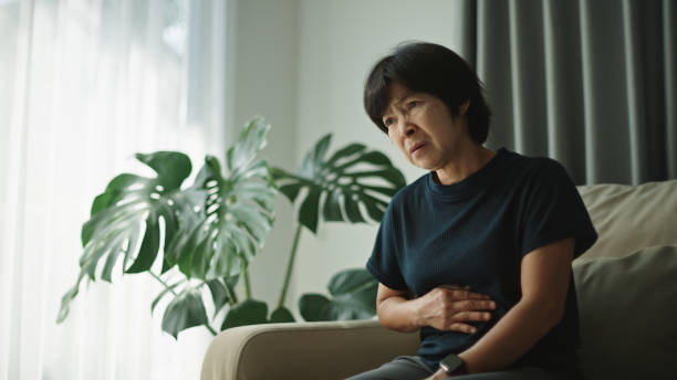 istock Mature woman having a stomachache. 2184122689