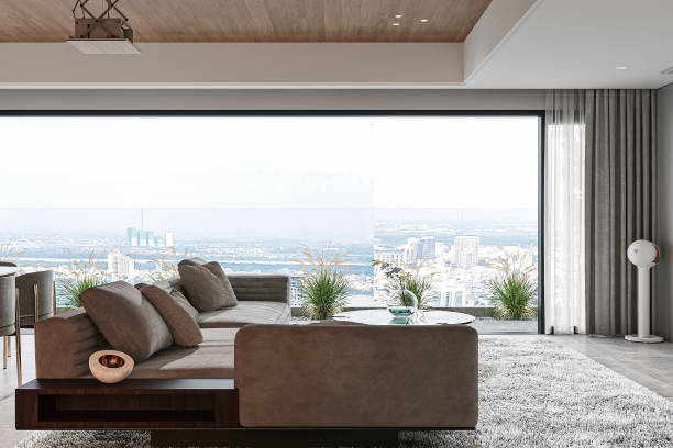 istock Luxury Living Room with Panoramic City View Through Large Windows 2184123542