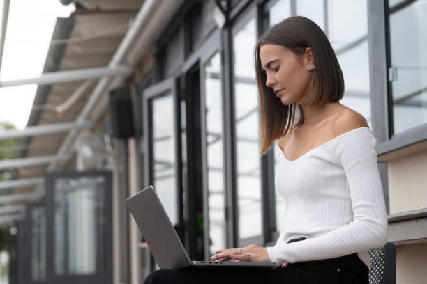 istock Financial adviser and investor on the phone while consulting data on a laptop computer 2184126271