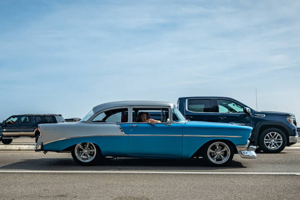 Gulfport, MS - October 04, 2023: Wide angle side view of a 1956 Chevrolet 210 2 Door Sedan at a local car show.