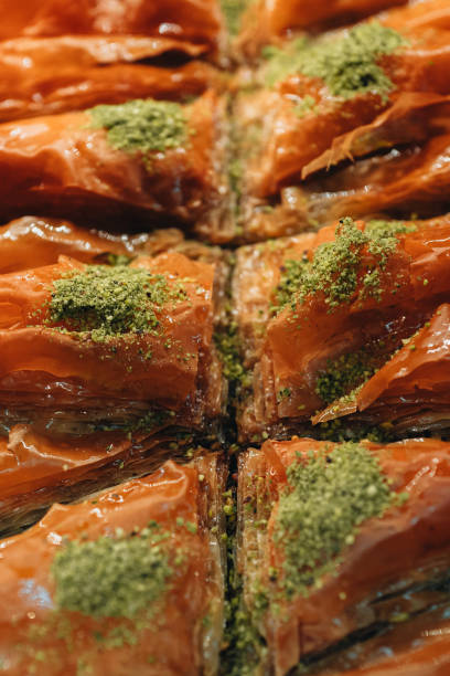 Sweet honey dessert with pistachio crumble baklava, traditional delicious Turkish sweets