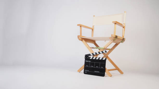 istock Director chair with clapper board on white background. 2184135921