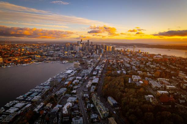 istock Seattle skyline at sunset with vibrant clouds and cityscape. 2184135968