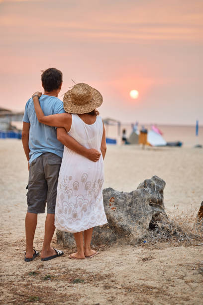 istock Senior couple enjoying sunrise 2184139547