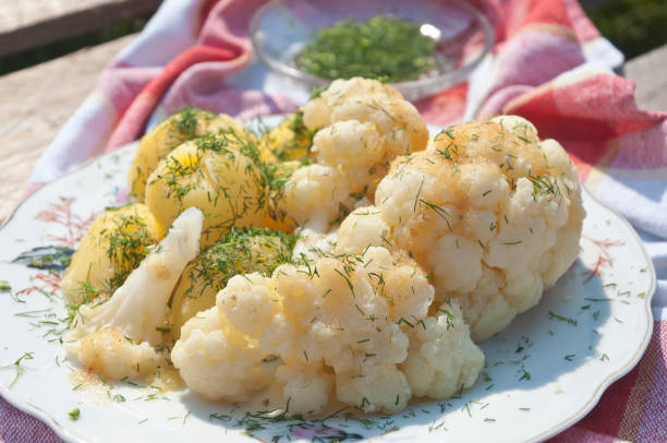 istock Cauliflower with potatoes sprinkled with dill 2184142896