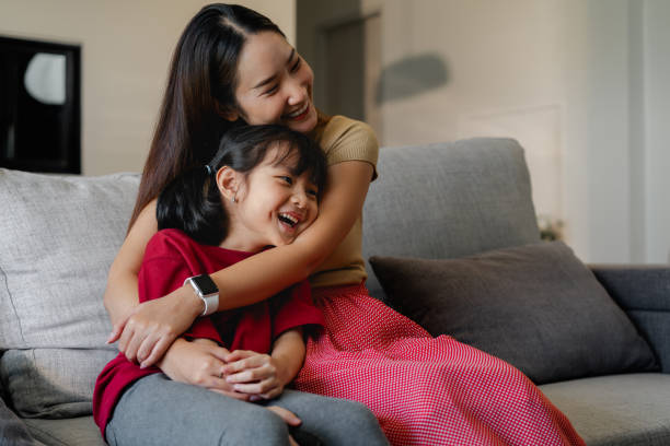 istock Happy Family Moment: Mother and Daughter Bonding with Love and Laughter 2184143050