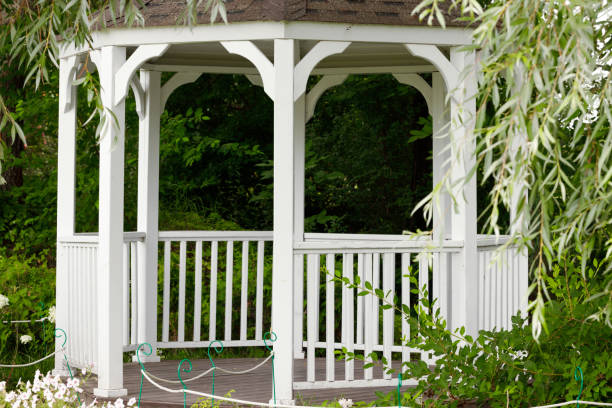 istock gazebo white frame summer space building wooden construction in garden green foliage environment place 2184145408