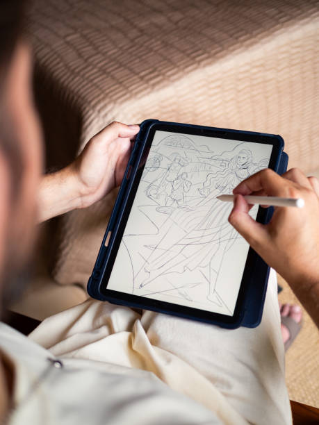 istock Artist sketching a concept on a digital tablet in a cozy room 2184150477