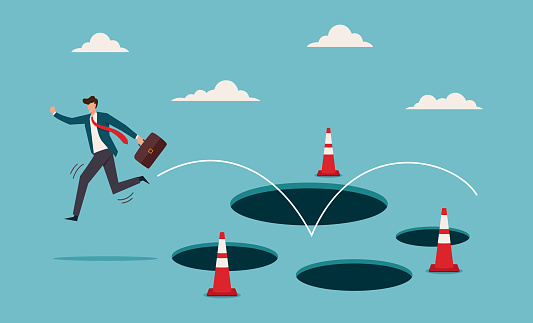 Navigate Obstacles Businessman Navigating Obstacles With Cones Marking Danger Jumping Over ...