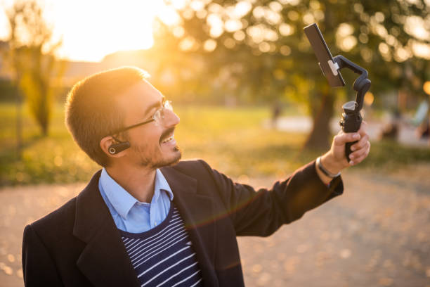 istock Businessman vlogging outdoor 2184154040