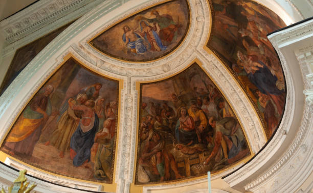 istock Frescoes depicting biblical scenes adorn church ceiling 2184154370