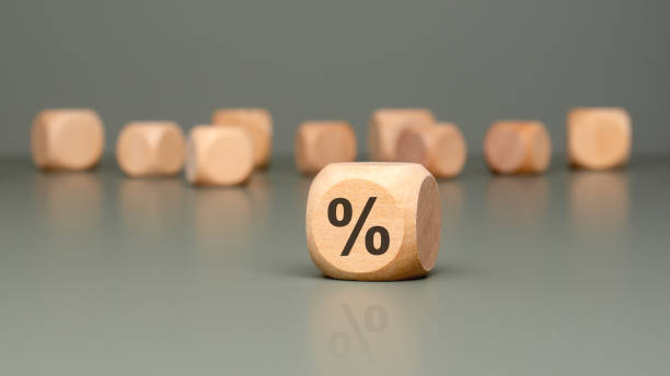 istock Wooden Percentage Dice designed specifically for use in various Financial Themes and contexts 2184159681