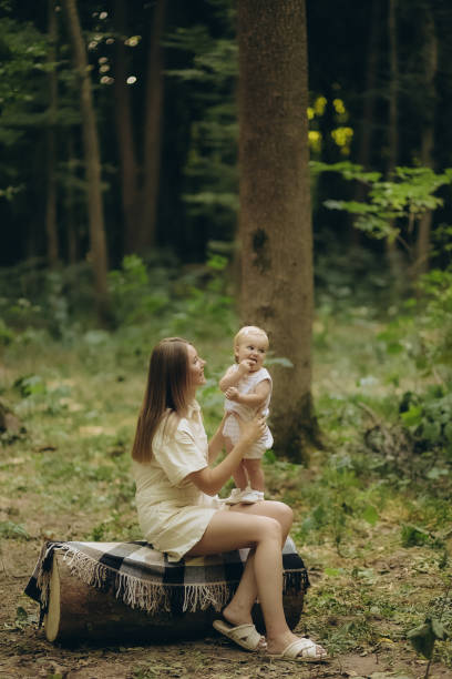 A happy family spending time and walking in the forest