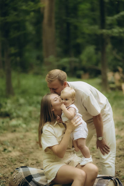 istock a young family on a picnic in the forest 2184164498