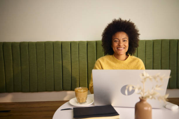 istock A African American university student typing out an essay 2184170067
