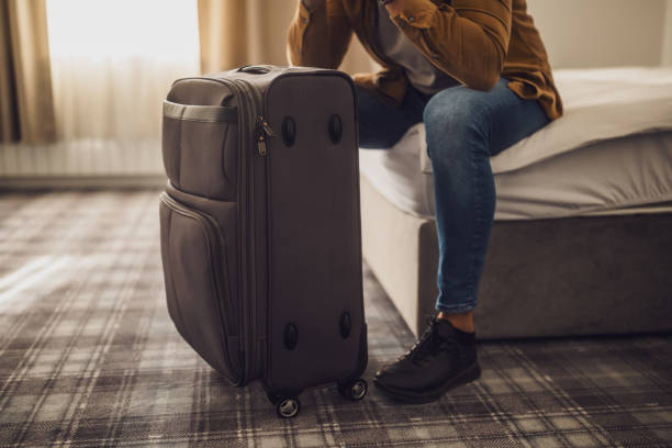 istock Man in hotel room 2184172211