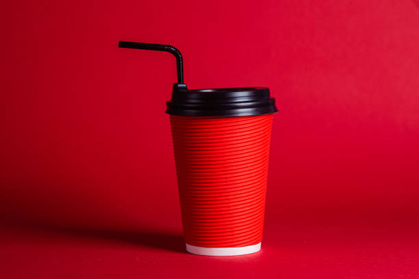 istock Red paper coffee cup close-up 2184172320