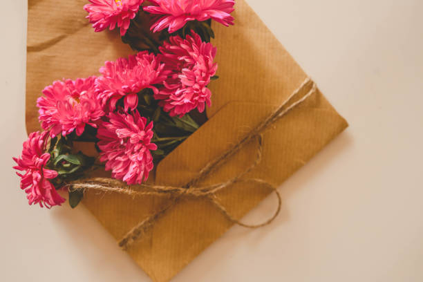 istock Autumn asters on pink background, holiday concept 2184172741