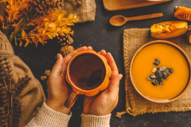istock Cup of tea in hands, autumn mood 2184173789