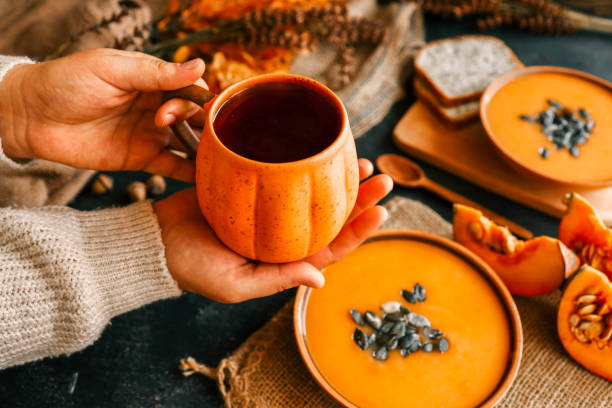 istock Cup of tea in hands, autumn mood 2184173795