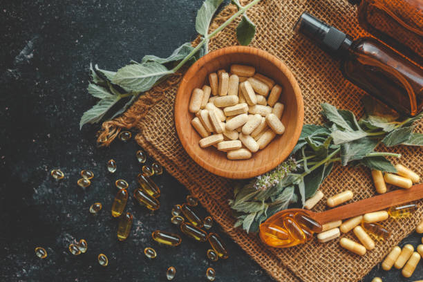 istock Natural vitamins organic on dark background 2184173885