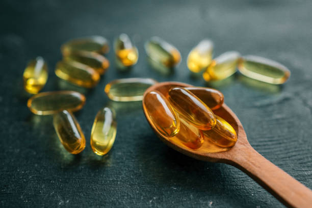 istock Omega 3 vitamins on dark background, copy space 2184173928