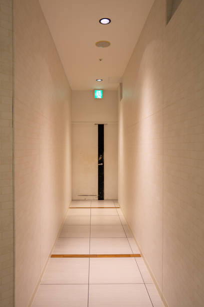 Narrow white rooms and wall materials.
